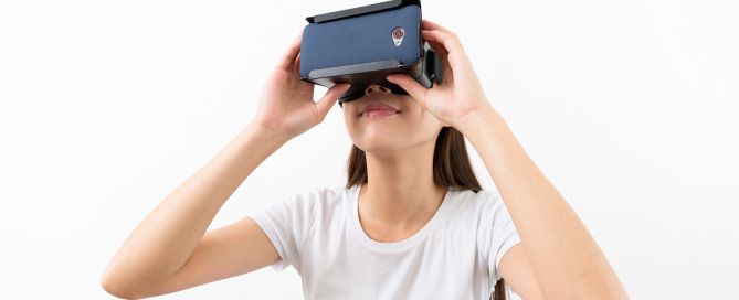 Asian woman watch with VR device